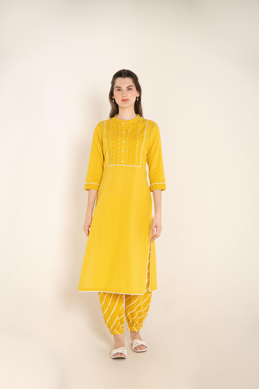 Yellow Cotton Kurta with Cutwork Embroidered Yoke with Stripes Afghani Salwar.