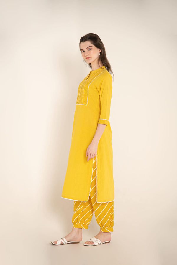 Yellow Cotton Kurta with Cutwork Embroidered Yoke with Stripes Afghani Salwar.