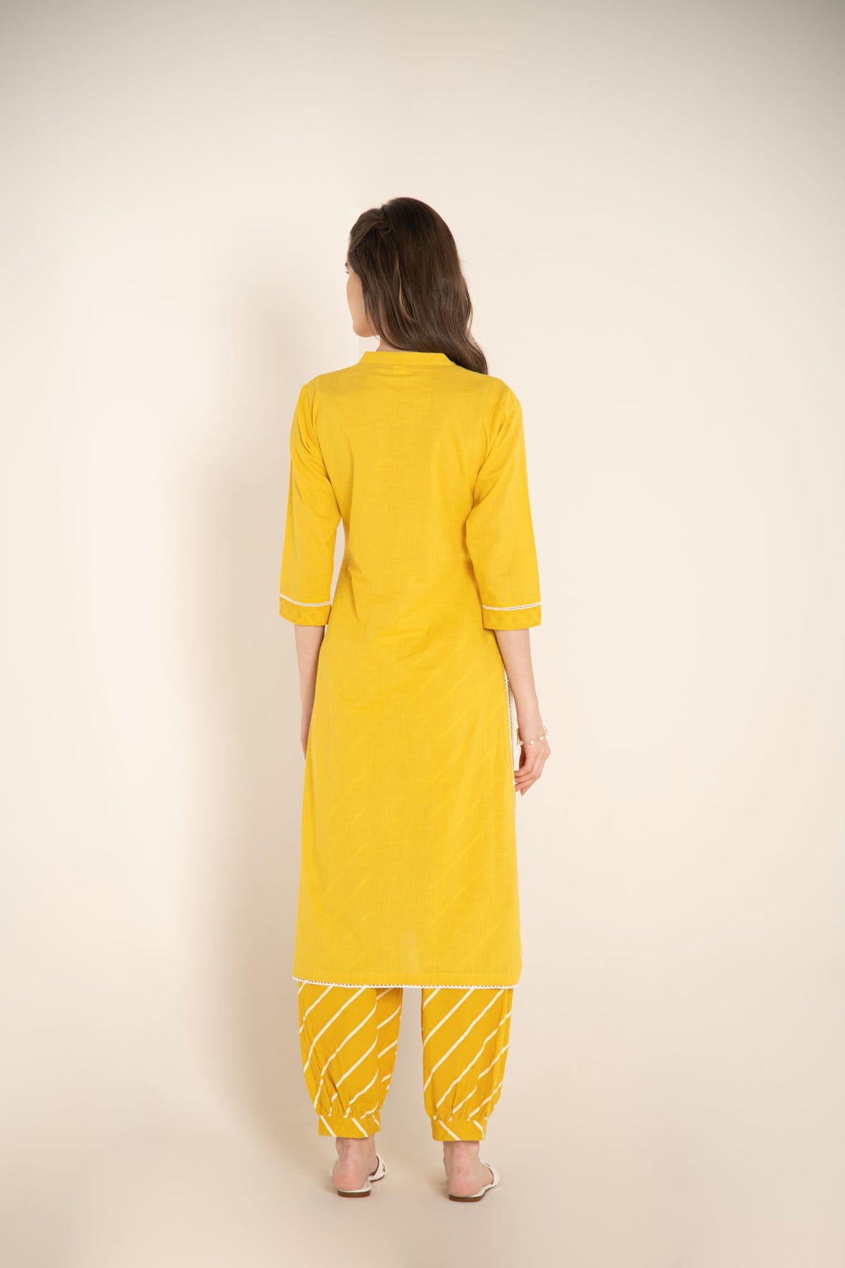 Yellow Cotton Kurta with Cutwork Embroidered Yoke with Stripes Afghani Salwar.